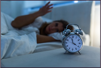 A woman that is having trouble sleeping